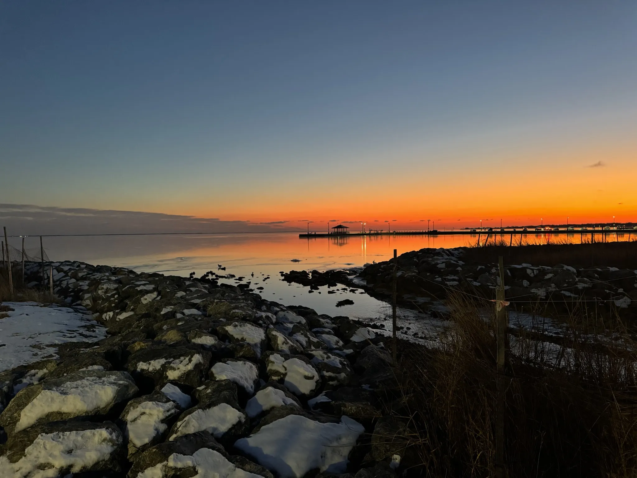 Sunset over the Great South Bay from the rocky shoreline near the house